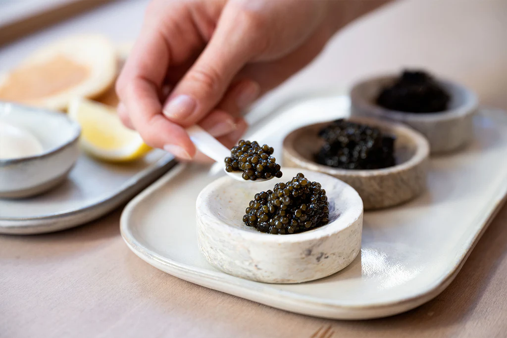 Serving of premium caviar illustrating what does caviar taste like